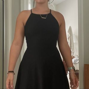 Black dress size xs but can stretch